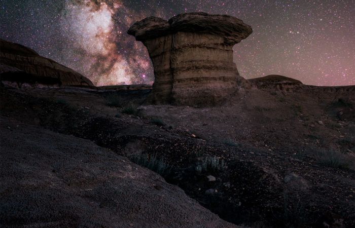 A hoodoo in Avonlea, Saskatchewan with the milky way over it