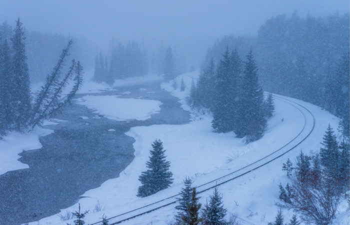 Landscape Photography in a snowstorm at Morant's Curve in the Canadian Rockies, Alberta