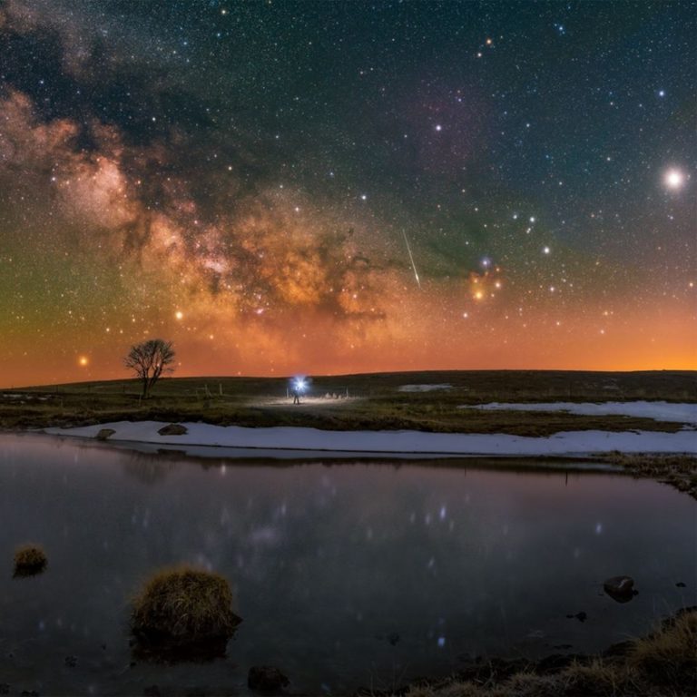 Photography workshop leader Scott Aspinall under the milky way in Saskatchewan