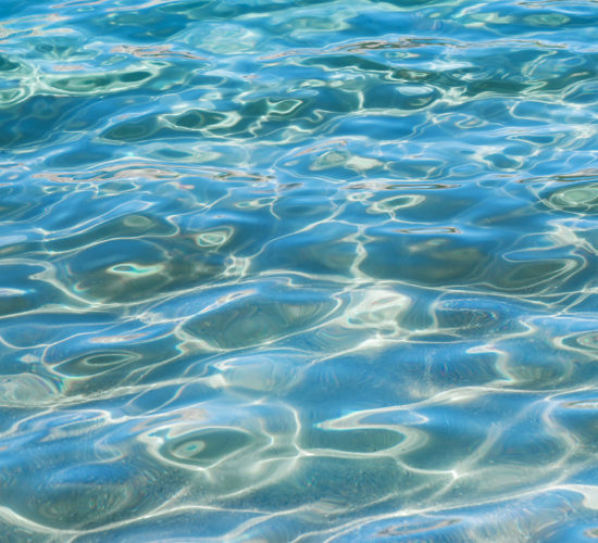 An abstract photo of the water on Cerulean Lake in Mount Assiniboine Provincial Park