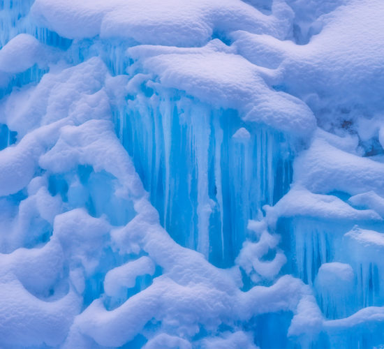 An intimate landscape photograph of the ice at Johnston Canyon in Banff National Park