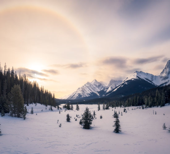 Landscape photography of a sun halo in the Canadian Rockies during winter