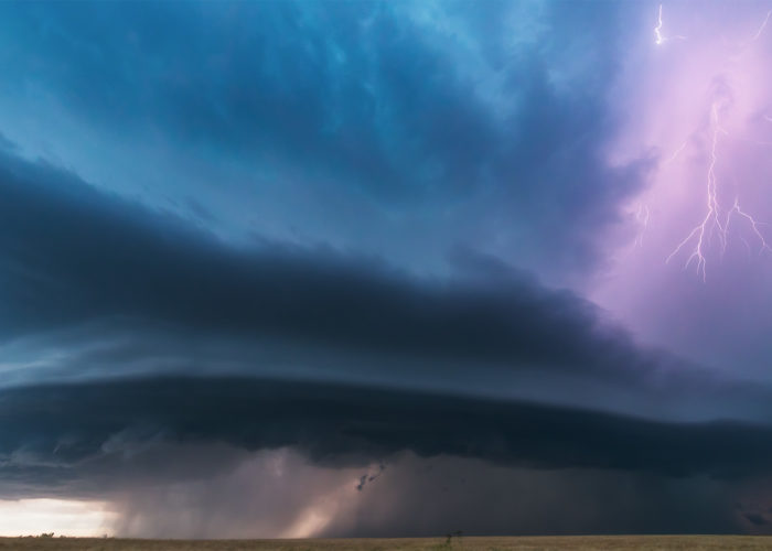 Storm photography of a supercell thunderstorm on the Canadian Prairies at twilight