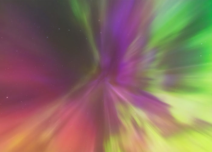 An aurora borealis explosion overhead called carona