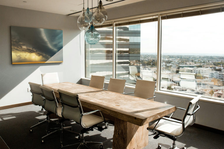 A corporate boardroom decorated with a fine art photography print