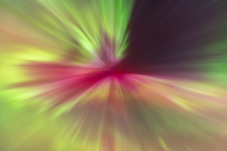 A photograph of the Aurora Borealis corona. Shaped like a butterfly