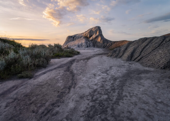 A landsacape photograph of a hoodoo at sunset in Saskatchewan